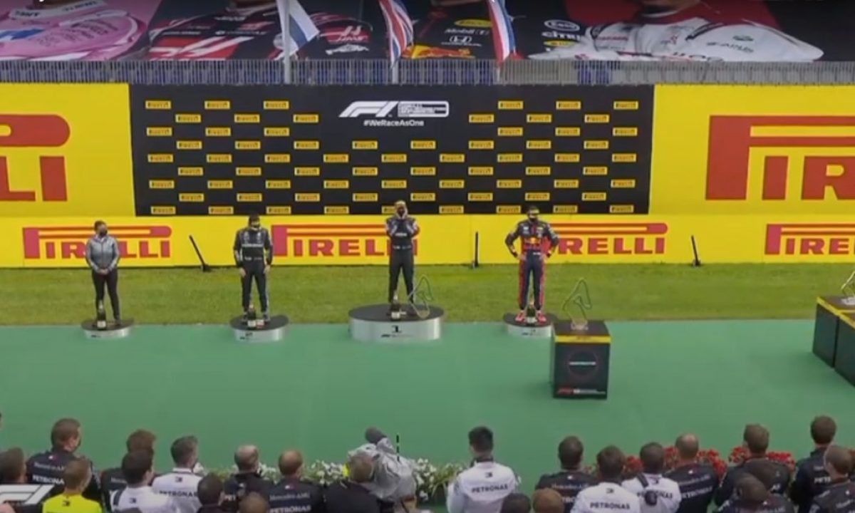 Robots entregan los premios de formula 1 evitando contacto físico ...